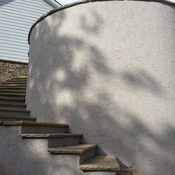 in-ground spa with retainer wall