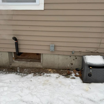 A safe outdoor inlet so a portable generator can power the house without extensi