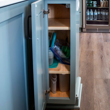Custom Two-Toned Green and White Kitchen with Laventa Carrara Quartz Countertops