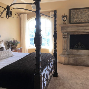Old world finish on stone fireplace