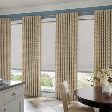 Layering cell shades and drapery panels