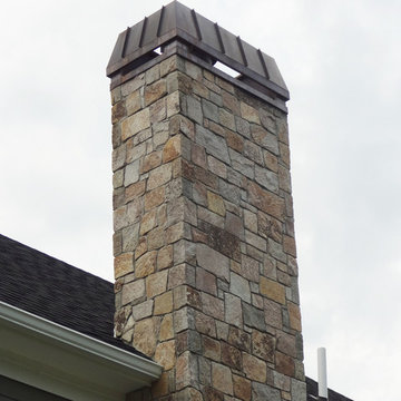 Combining Colonial Tan Natural Stone with Olive Green Siding