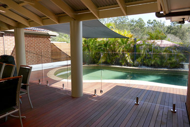 Inspiration for a large tropical deck in Brisbane.
