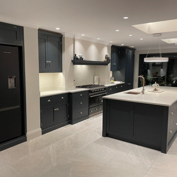 Modern monochrome handmade kitchen with full length larder