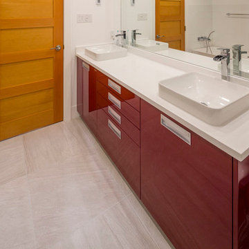 Downtown Vancouver Condo with Glossy Red Modern Bathroom