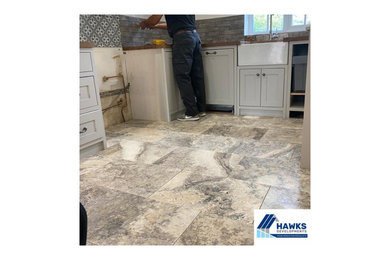 This is an example of a rural u-shaped enclosed kitchen in Kent with a belfast sink, shaker cabinets, grey cabinets, wood worktops, multi-coloured splashback, stone tiled splashback, porcelain flooring, no island and multi-coloured floors.