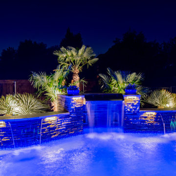 Transitional Curved Cool Pool with Amazing Water Features