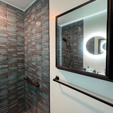 Laguna Hills Bathroom Remodel with Rich Tile Texture and Matte Black Accents