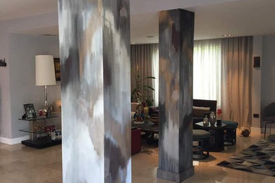 Inspiration for a mid-sized modern ceramic tile and beige floor living room remodel in Miami with beige walls and no tv