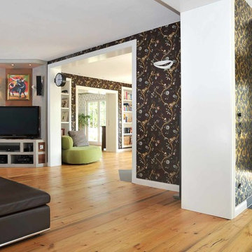Wohnzimmer: Wohnbereich mit Kaminofen, TV u. Dielen