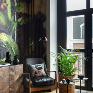 Small urban mezzanine living room in Moscow with multi-coloured walls, medium hardwood flooring, a wall mounted tv and beige floors.