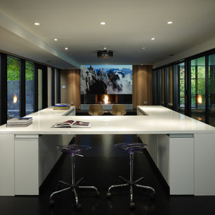 Design ideas for a medium sized modern open plan home cinema in Seattle with a projector screen, white walls, dark hardwood flooring and black floors.