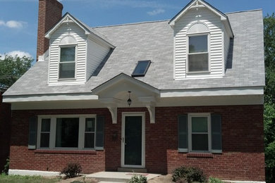 Mid-sized traditional white two-story mixed siding exterior home idea in St Louis with a shingle roof