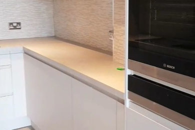 Photo of a modern u-shaped kitchen/diner in London.
