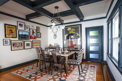 Mid-sized eclectic medium tone wood floor great room photo in San Francisco with white walls and no fireplace