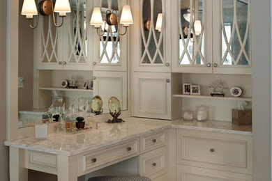 Inspiration for a huge timeless white tile marble floor bathroom remodel in Orlando with an integrated sink, raised-panel cabinets, white cabinets, marble countertops and gray walls