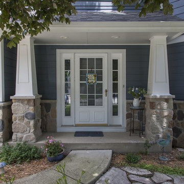 Shiny new Andersen Windows, Evening Blue James Hardie siding & stone accents