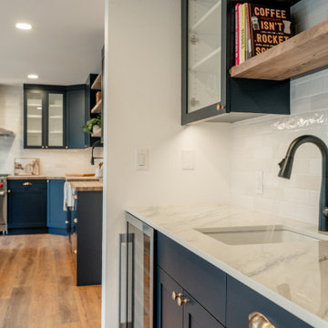 Modern Navy Wet Bar with Polished Brass Hardware and Wine Fridge