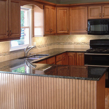 Remodeled Traditional Kitchen-Rich Maple Cabinets - Black Granite & Appliances