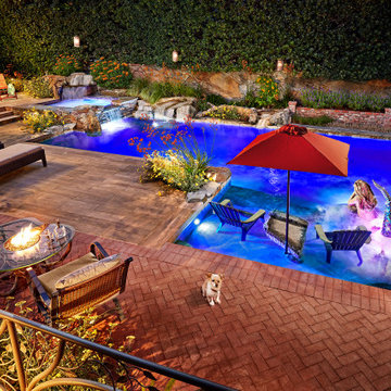 Backyard pool with firepit table
