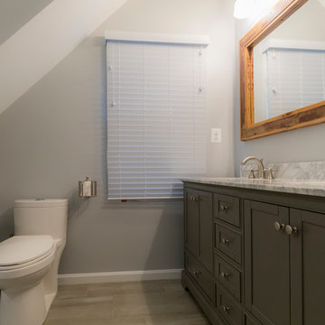 New bathroom with large double vanity sink.