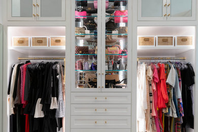 Inspiration for a large transitional women's carpeted and beige floor walk-in closet remodel in Dallas with white cabinets