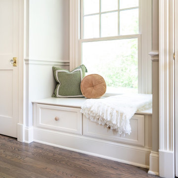 Elegant Entryway with White Door and Natural Light