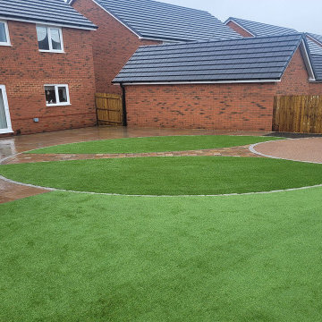 Raj Green Sandstone Patio and Artificial Grass