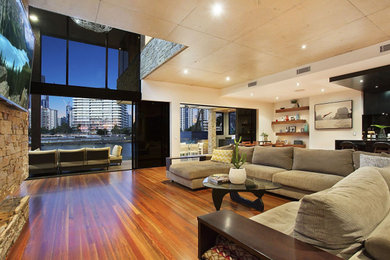 Photo of a modern family room in Gold Coast - Tweed.