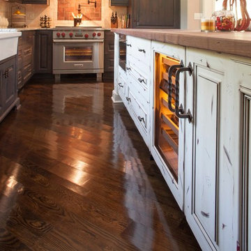 Rustic Alder cabinetry with painted and glazed island.