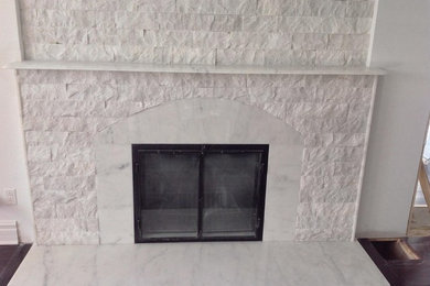Inspiration for a transitional marble floor dining room remodel in Montreal with white walls