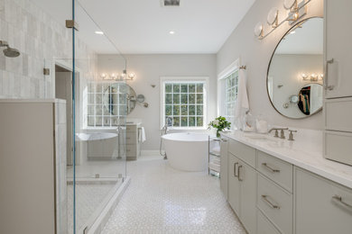 Freestanding bathtub - modern master subway tile mosaic tile floor and double-sink freestanding bathtub idea in Boston with shaker cabinets and a built-in vanity