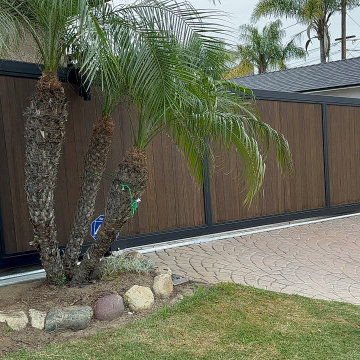 Custom Wood Fence with Metal Trim Installation | O.T. Gates and Fence Repair