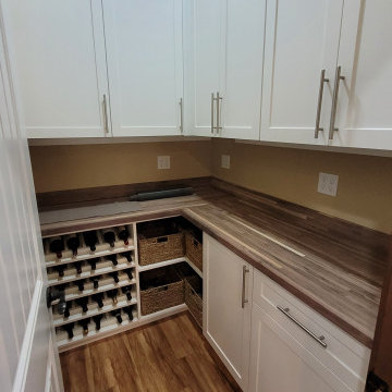 Walk in pantry with built in wine rack