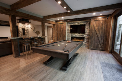 Basement - rustic gray floor basement idea in Cincinnati