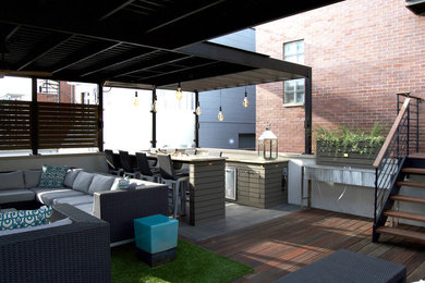 Outdoor kitchen deck - mid-sized contemporary rooftop outdoor kitchen deck idea in Chicago with an awning