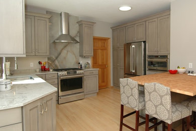 Example of a kitchen design in Minneapolis with porcelain backsplash