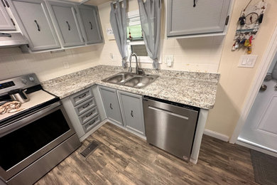 Example of a mid-sized kitchen design in Other