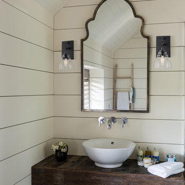 Muncie 1 Light Sconce in Corsican Bronze with a Clear Insulator Glass Shade