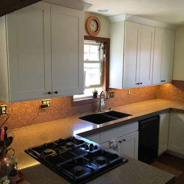 LED under cabinet lighting with refaced base cabinets