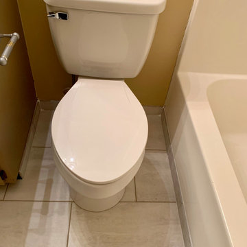 Lin Don. New tile and toilet installed