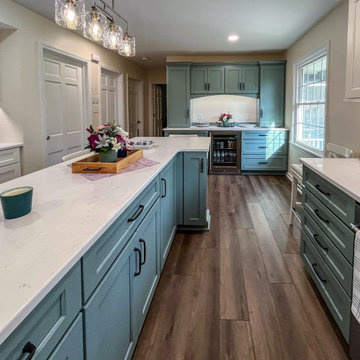 Custom Two-Toned Green and White Kitchen with Laventa Carrara Quartz Countertops