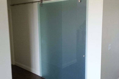 Inspiration for a contemporary closet remodel in Orange County