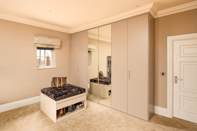 Design ideas for a large contemporary wardrobe in Other.