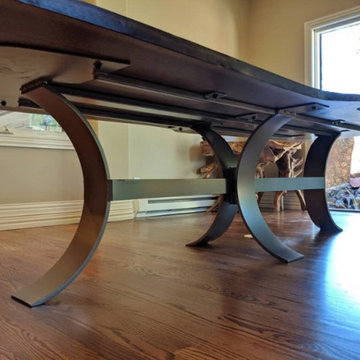 Book matched Walnut Slab Dining Table With Rolled Steel Base