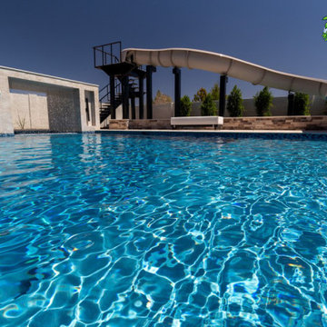 Paradise Slides Model PS52L-C project by Quality Pool Construction