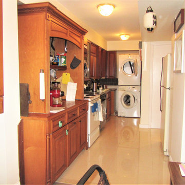 Before - Kitchen with mismatched cabinets