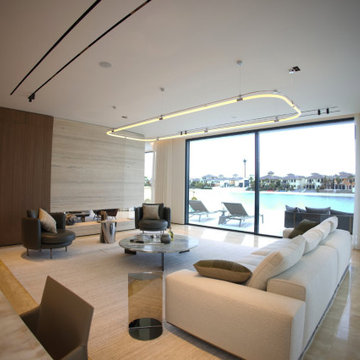 Formal Waterfront Living Room with Sculptural Pendant Light
