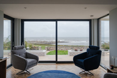 Design ideas for a beach style living room in Other.
