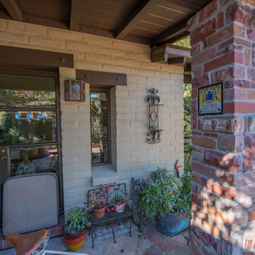Adobe home with brick clinker column